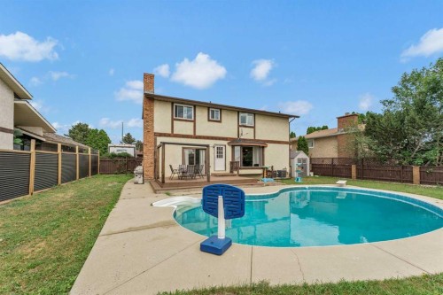 45 Cooper Road Se, Medicine Hat, AB - Outdoor With In Ground Pool With Deck Patio Veranda With Backyard With Exterior