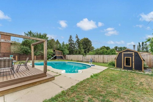 45 Cooper Road Se, Medicine Hat, AB - Outdoor With In Ground Pool With Backyard