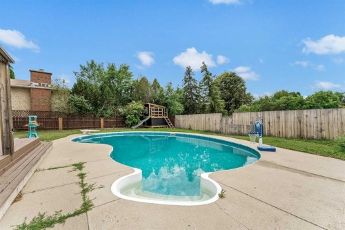 45 Cooper Road Se, Medicine Hat, AB - Outdoor With In Ground Pool With Backyard