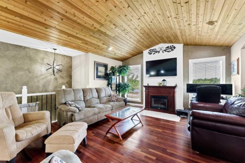 7312 Township Road 124, Rural Cypress County, AB - Indoor Photo Showing Living Room With Fireplace