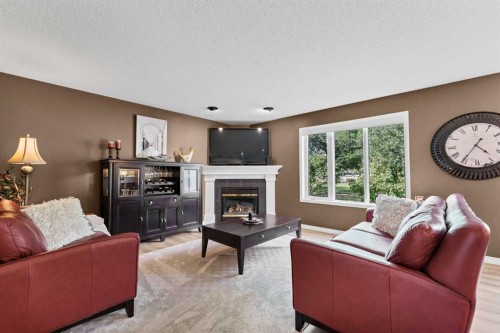 1A Stonegate Crescent Se, Medicine Hat, AB - Indoor Photo Showing Living Room With Fireplace