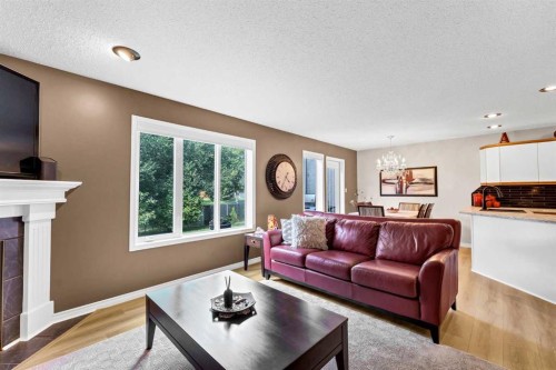 1A Stonegate Crescent Se, Medicine Hat, AB - Indoor Photo Showing Living Room With Fireplace