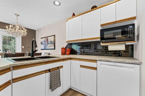 1A Stonegate Crescent Se, Medicine Hat, AB - Indoor Photo Showing Kitchen With Double Sink