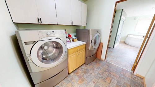 209 2 Avenue, Burdett, AB - Indoor Photo Showing Laundry Room