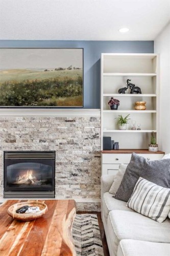 26 Ranchlands Way Ne, Medicine Hat, AB - Indoor Photo Showing Living Room With Fireplace