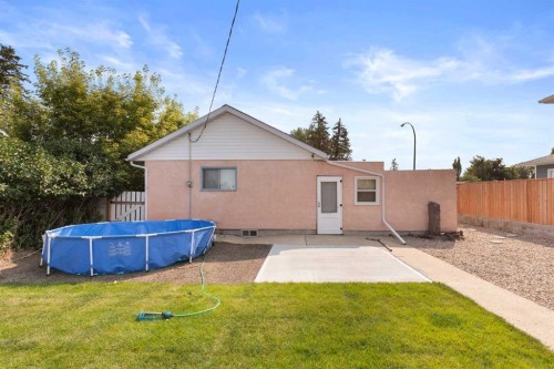 802 2 Street Se, Redcliff, AB - Outdoor With Above Ground Pool