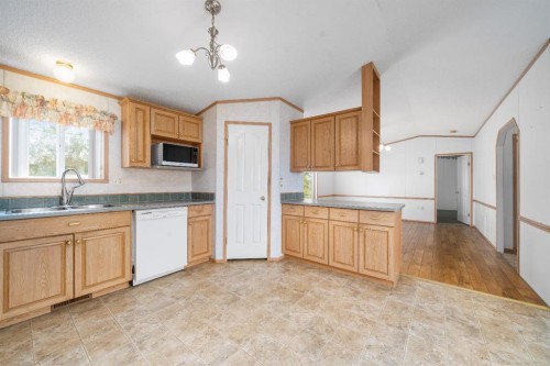 210 5 Street Nw, Redcliff, AB - Indoor Photo Showing Kitchen With Double Sink