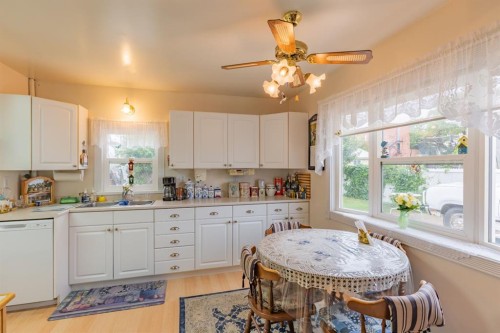 106 2 Street Ne, Redcliff, AB - Indoor Photo Showing Kitchen With Double Sink