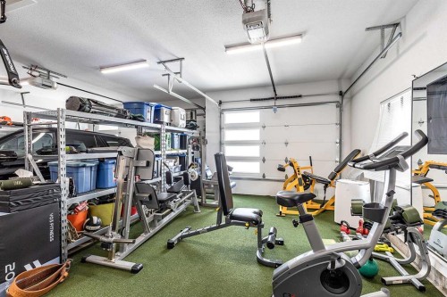 21 Hamptons Gate Se, Medicine Hat, AB - Indoor Photo Showing Gym Room