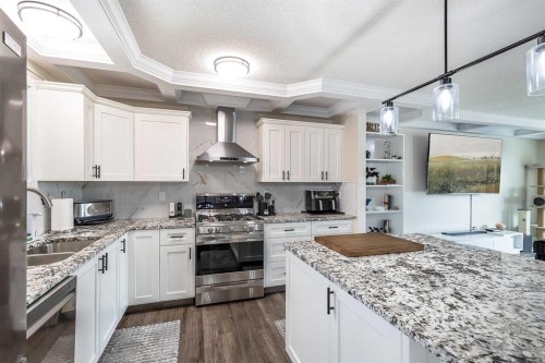 73 Cooper Road Se, Medicine Hat, AB - Indoor Photo Showing Kitchen With Double Sink With Upgraded Kitchen