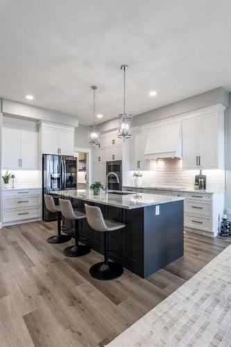 57 Hamptons Gate Se, Medicine Hat, AB - Indoor Photo Showing Kitchen With Upgraded Kitchen