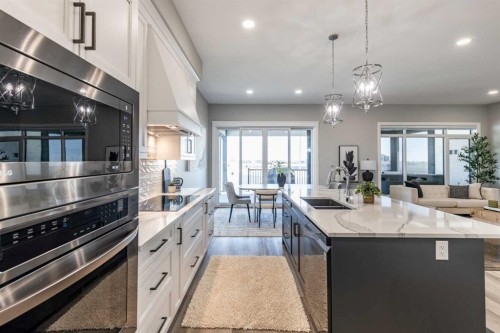 57 Hamptons Gate Se, Medicine Hat, AB - Indoor Photo Showing Kitchen With Double Sink With Upgraded Kitchen