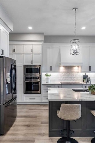 57 Hamptons Gate Se, Medicine Hat, AB - Indoor Photo Showing Kitchen With Upgraded Kitchen