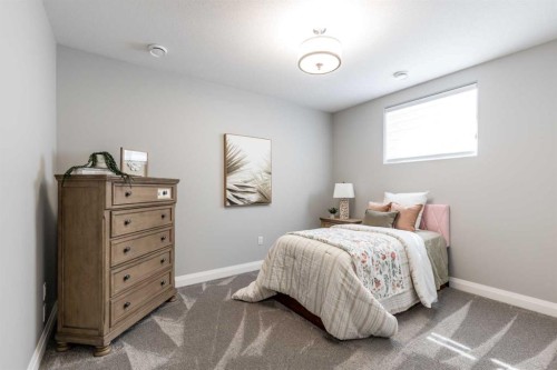 57 Hamptons Gate Se, Medicine Hat, AB - Indoor Photo Showing Bedroom