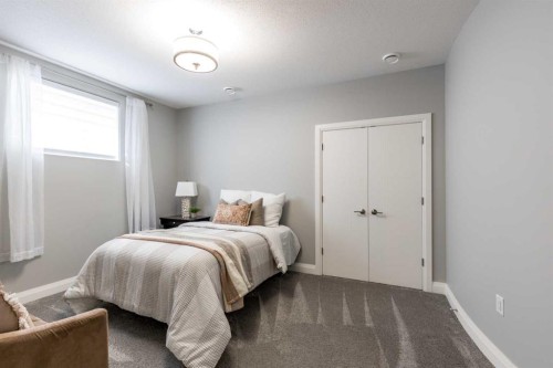 57 Hamptons Gate Se, Medicine Hat, AB - Indoor Photo Showing Bedroom