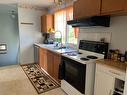 518 6 Avenue, Fox Creek, AB  - Indoor Photo Showing Kitchen With Double Sink 