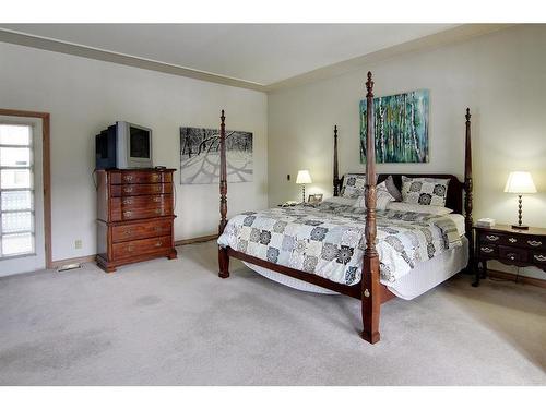 4 Cascade Court, Banff, AB - Indoor Photo Showing Bedroom