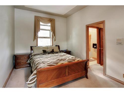 4 Cascade Court, Banff, AB - Indoor Photo Showing Bedroom