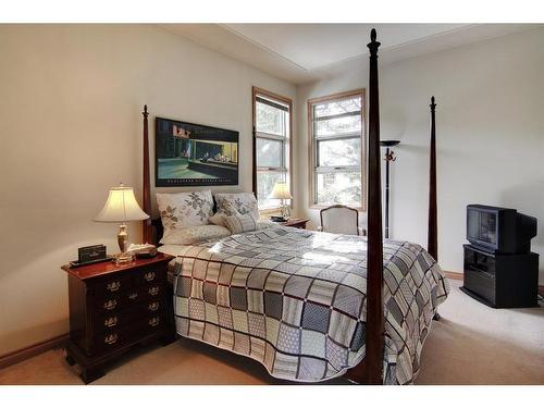 4 Cascade Court, Banff, AB - Indoor Photo Showing Bedroom