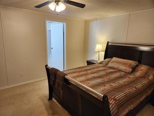 902 4 Avenue, Fox Creek, AB - Indoor Photo Showing Bedroom