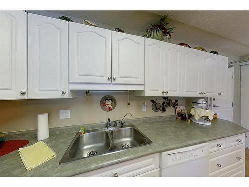 306-777 48 Street, Edson, AB - Indoor Photo Showing Kitchen With Double Sink