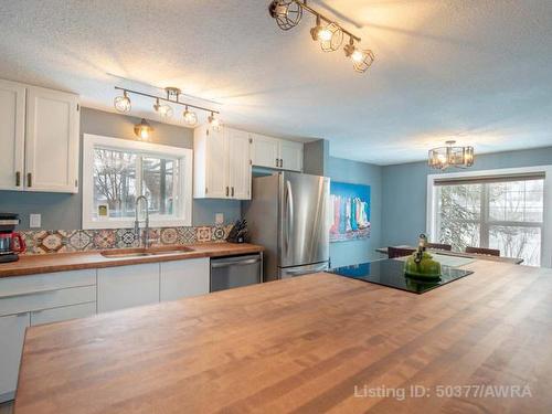 73 Nielsen Drive, Island Lake, AB - Indoor Photo Showing Kitchen