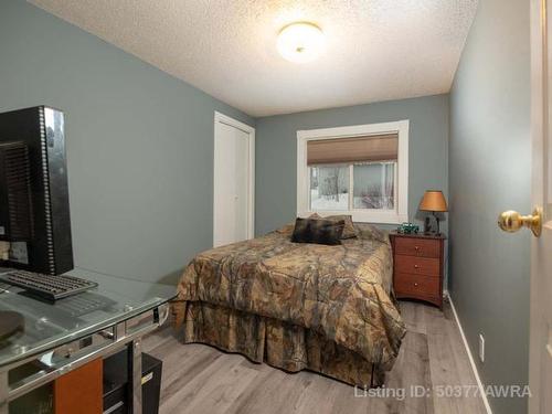 73 Nielsen Drive, Island Lake, AB - Indoor Photo Showing Bedroom