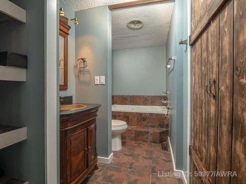 73 Nielsen Drive, Island Lake, AB - Indoor Photo Showing Bathroom