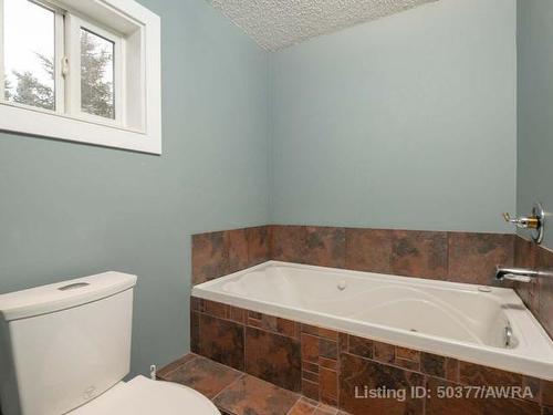 73 Nielsen Drive, Island Lake, AB - Indoor Photo Showing Bathroom