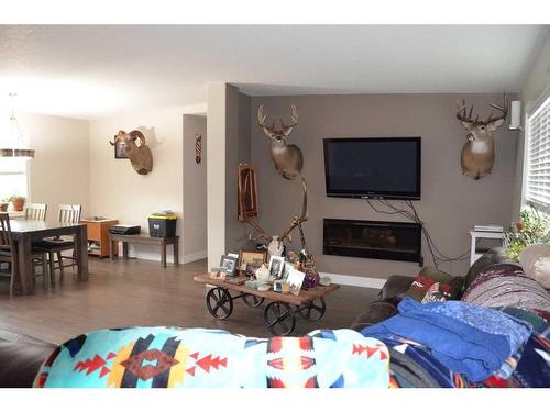 194077 Township Road 643, Rural Athabasca County, AB - Indoor Photo Showing Living Room With Fireplace