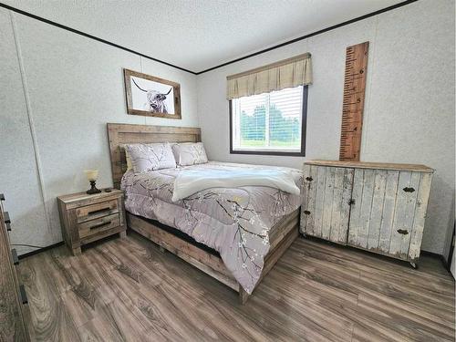 106, 590079 Range Road 113, Rural Woodlands County, AB - Indoor Photo Showing Bedroom