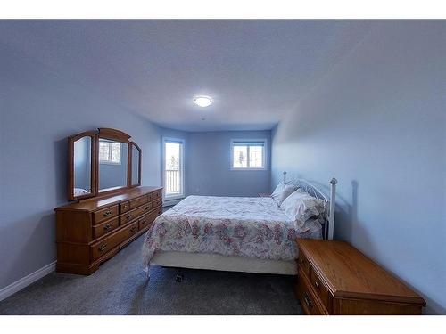 303-5037 7 Avenue, Edson, AB - Indoor Photo Showing Bedroom