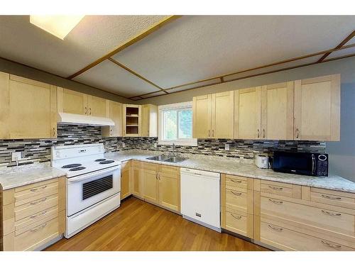 6603 5 Avenue, Edson, AB - Indoor Photo Showing Kitchen With Double Sink