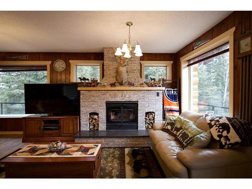51005 Highway 40 N, Rural Yellowhead County, AB - Indoor Photo Showing Living Room With Fireplace
