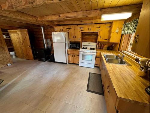 50423A Highway 16, Rural Yellowhead County, AB - Indoor Photo Showing Kitchen With Double Sink