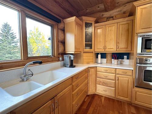 583030B Range Road 121, Rural Woodlands County, AB - Indoor Photo Showing Kitchen With Double Sink