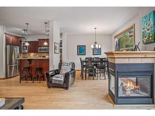511-80 Dyrgas Gate, Canmore, AB - Indoor With Fireplace