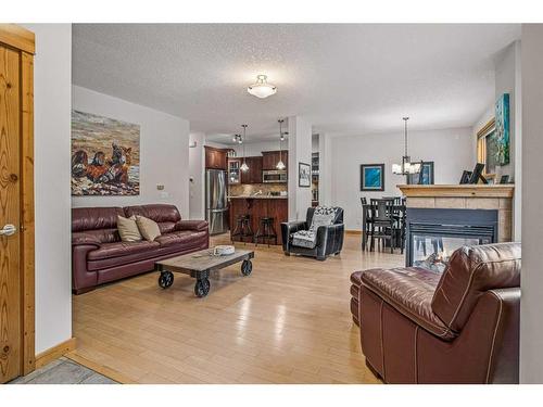 511-80 Dyrgas Gate, Canmore, AB - Indoor Photo Showing Living Room With Fireplace