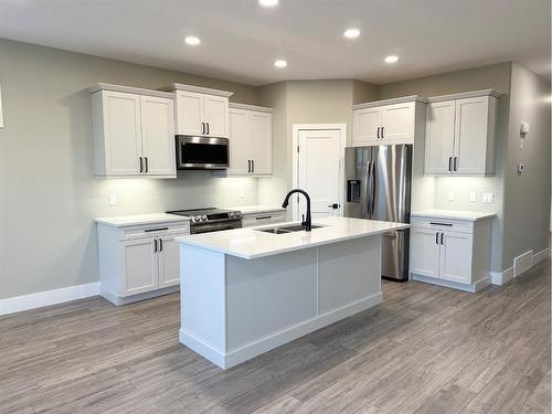 59 Riverstone Road, Whitecourt, AB - Indoor Photo Showing Kitchen With Upgraded Kitchen
