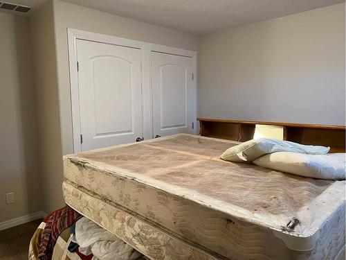 701 5 A Street, Fox Creek, AB - Indoor Photo Showing Bedroom