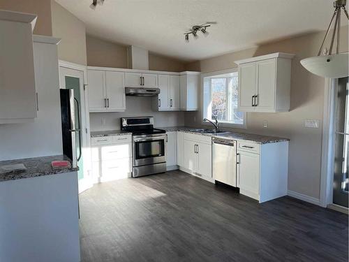 701 5 A Street, Fox Creek, AB - Indoor Photo Showing Kitchen With Double Sink