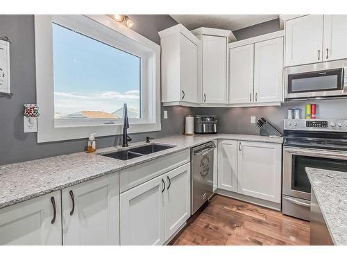 6706 40A Avenue, Stettler, AB - Indoor Photo Showing Kitchen With Double Sink