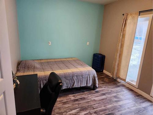 594028 Range Road 130, Rural Woodlands County, AB - Indoor Photo Showing Bedroom
