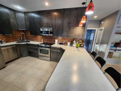 594028 Range Road 130, Rural Woodlands County, AB - Indoor Photo Showing Kitchen With Upgraded Kitchen
