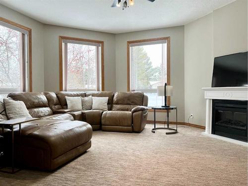 4228 8 Avenue, Edson, AB - Indoor Photo Showing Living Room With Fireplace