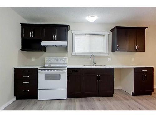 745 Cardinal Crescent, Wabasca, AB - Indoor Photo Showing Kitchen With Double Sink