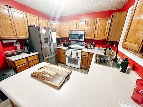 29 Chaisson Crossing, Whitecourt, AB - Indoor Photo Showing Kitchen With Double Sink