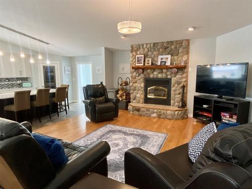 59 Ravine Drive, Whitecourt, AB - Indoor Photo Showing Living Room With Fireplace