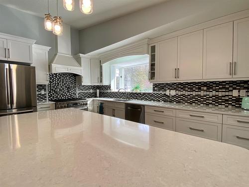 59 Ravine Drive, Whitecourt, AB - Indoor Photo Showing Kitchen With Double Sink With Upgraded Kitchen