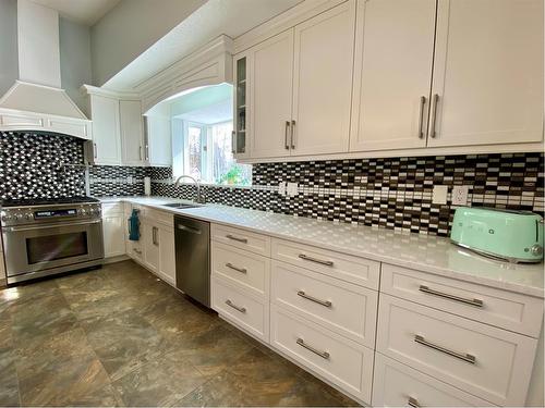 59 Ravine Drive, Whitecourt, AB - Indoor Photo Showing Kitchen With Upgraded Kitchen